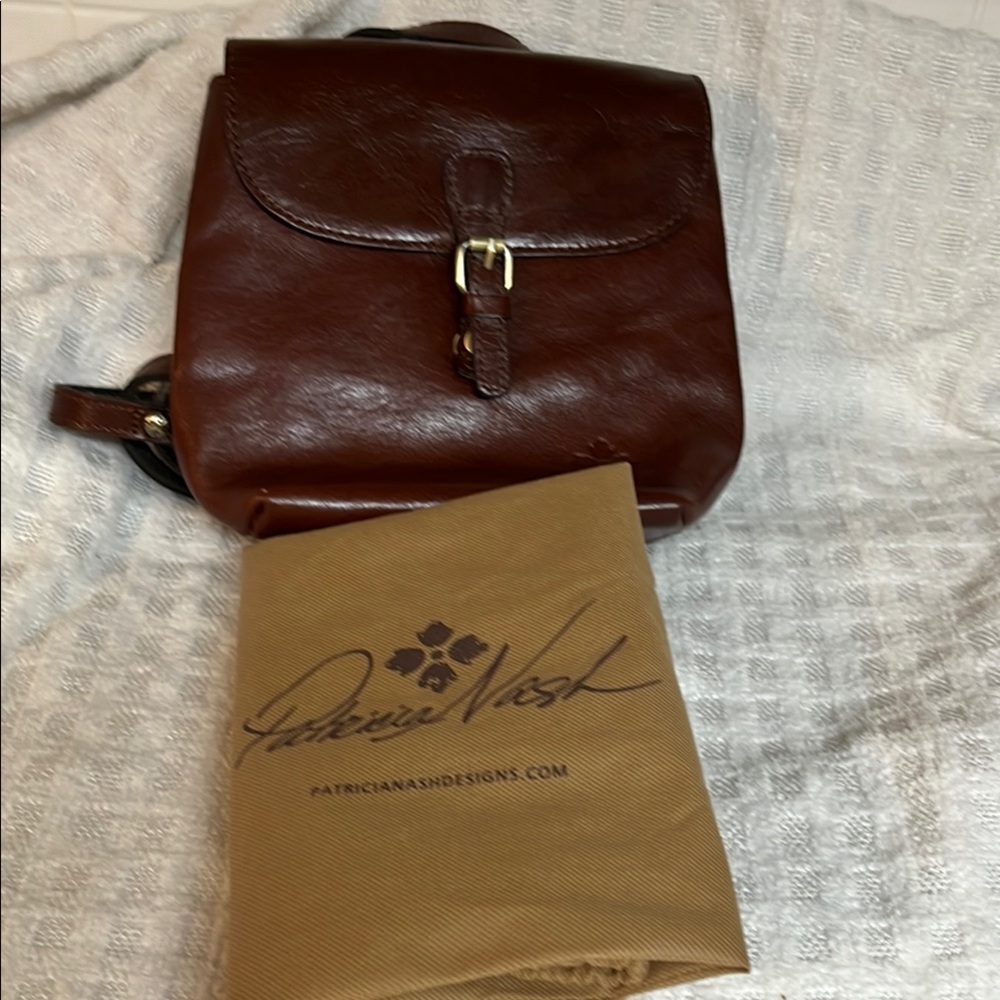 Patricia Nash's Vatoni backpack in brown full-grain leather. Has been used.